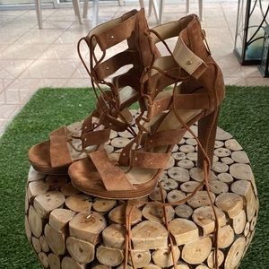 Brown Micheal Kors laced up heels